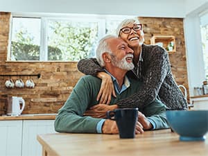 Home Comfort with Reliable HVAC System Couple enjoying a comfortable home with efficient heating and cooling system