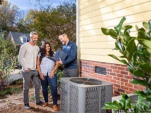 Air Conditioning and Heating Repair Service Technician repairing residential HVAC system components