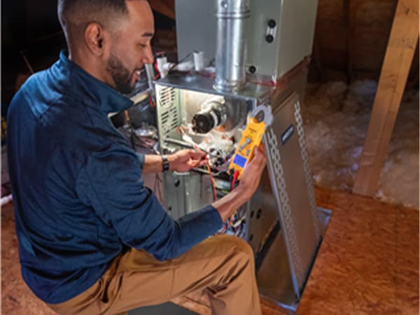 Professional Air Conditioning and Heating System Diagnostics Mid-Cities HVAC technician diagnosing an air conditioning system issue